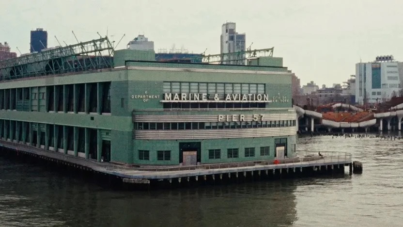 The historic green Marine & Aviation Pier 57 building on the Hudson River, New York.